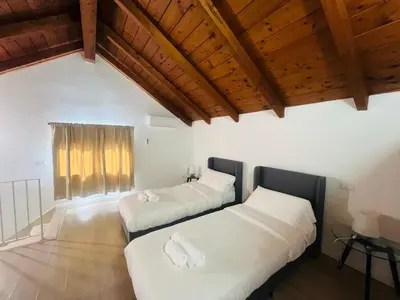 Letto o letti in una camera di La Costa nel Corso