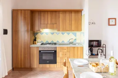 Cucina o angolo cottura di Villa Baia del corallo