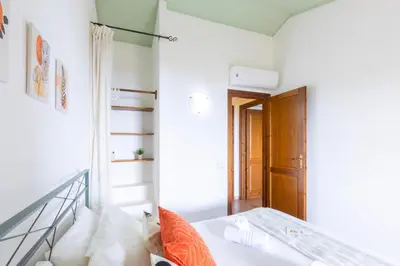 Letto o letti in una camera di Villa Baia del corallo