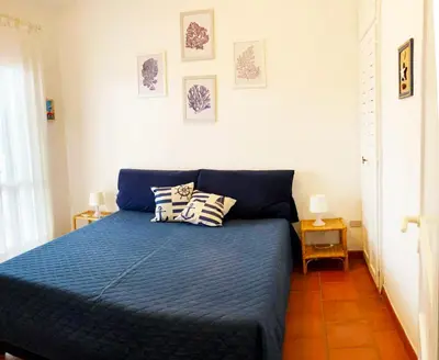 Letto o letti in una camera di Sisters' House
