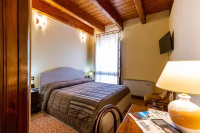 Letto o letti in una camera di Affittacamere Is Coronas