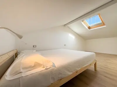 Letto o letti in una camera di Kalma Lux - Via Sardegna