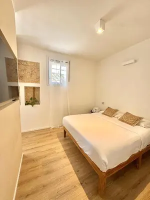 Letto o letti in una camera di Kalma Lux - Via Sardegna