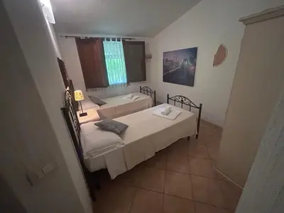 Letto o letti in una camera di Casa Doria - sea, pool, mountains, relax