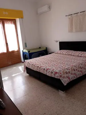 Letto o letti in una camera di Affittacamere Casa Chiara
