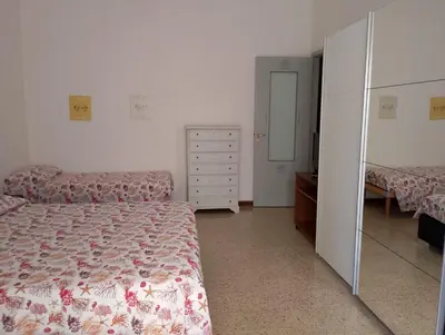 Letto o letti in una camera di Affittacamere Casa Chiara
