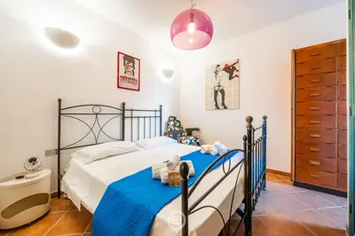 Letto o letti in una camera di Villa Melita
