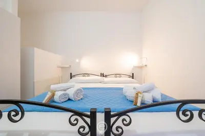 Letto o letti in una camera di La perla nel blu