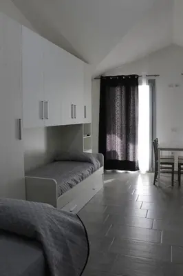 Letto o letti in una camera di Frontemare1