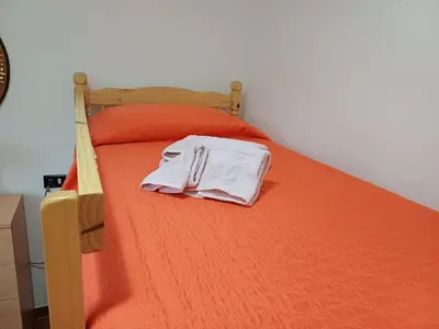 Letto o letti in una camera di Alessandro&Dina's House