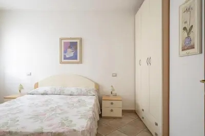 Letto o letti in una camera di Casa Vacanze Marconi a DONIGALA