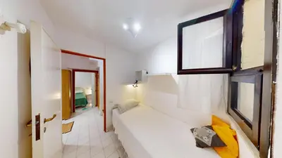 Letto o letti in una camera di Villa Marina