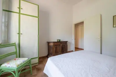 Letto o letti in una camera di Villa Renata