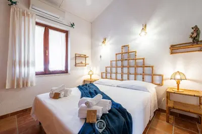 Letto o letti in una camera di Myricae - Una terrazza a due passi dal mare