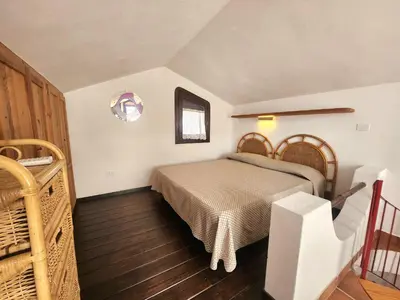 Letto o letti in una camera di Villa Rosanna Bestvacationever