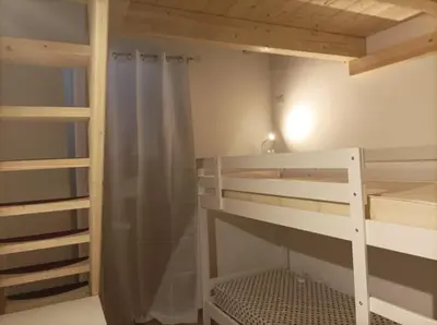 Letto o letti in una camera di Sant'Antioco appartamento moderno