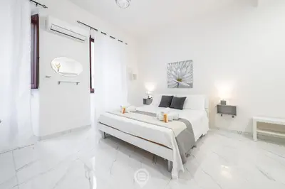 Letto o letti in una camera di Guest Room Historic Centre
