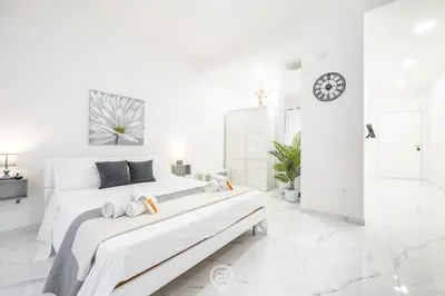 Letto o letti in una camera di Guest Room Historic Centre