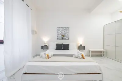 Letto o letti in una camera di Guest Room Historic Centre