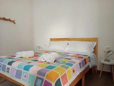 Letto o letti in una camera di il Guardiano delle due Baie Domus