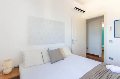 Letto o letti in una camera di Casa Futuro - Beautiful sea view with pool