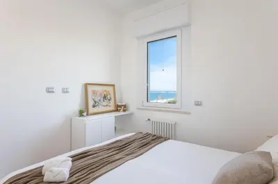 Letto o letti in una camera di Casa Futuro - Beautiful sea view with pool