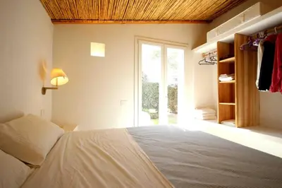 Letto o letti in una camera di Villa Maria Cristina, modern villa near beach