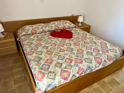 Letto o letti in una camera di Casa Silvana By La Via Del Mare Viaggi e Vacanze