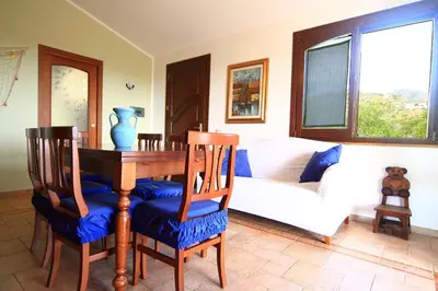 Area soggiorno di Capo Blu House With Sea View