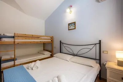 Letto o letti in una camera di Capo Blu House With Sea View