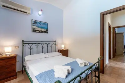 Letto o letti in una camera di Capo Blu House With Sea View