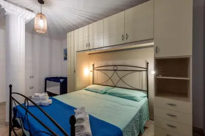 Letto o letti in una camera di Capo Blu House With Sea View