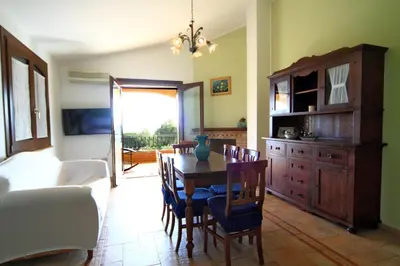 TV o dispositivi per l'intrattenimento presso Capo Blu House With Sea View
