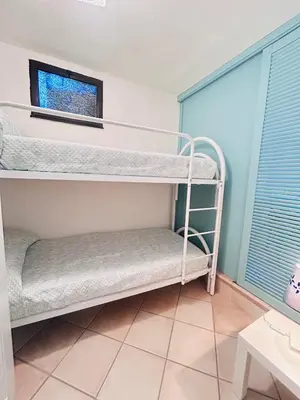 Letto o letti in una camera di Villa Azzurra a due passi dal mare