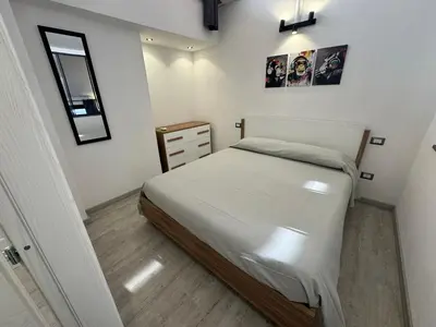 Letto o letti in una camera di Casa Lolly