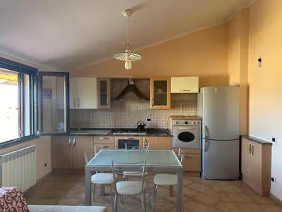 Cucina o angolo cottura di Apartment Piras&Tascedda Porto Frailis