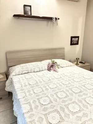 Letto o letti in una camera di Il Cortiletto