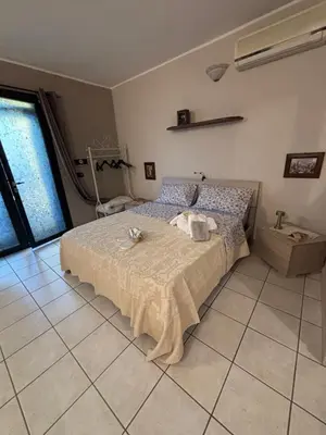 Letto o letti in una camera di Il Cortiletto