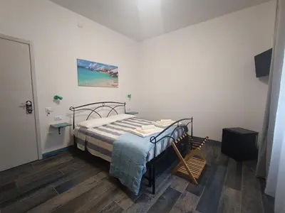 Letto o letti in una camera di Porto Sicuro Hospitality