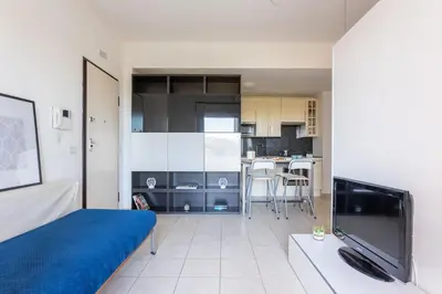 TV o dispositivi per l'intrattenimento presso Emerald Wave - House on the beach with pool
