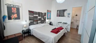 Letto o letti in una camera di B&B Leo