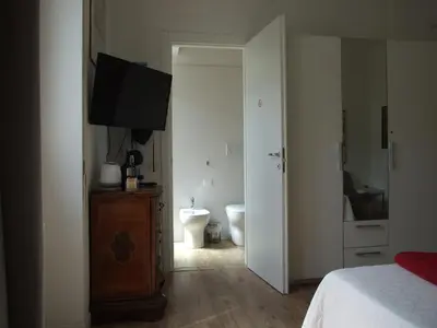 Letto o letti in una camera di B&B Leo