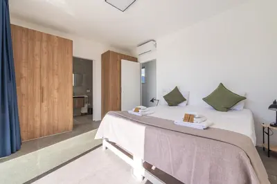 Letto o letti in una camera di Villa Gali