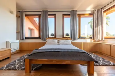 Letto o letti in una camera di Villa Praesidium pied dans l'eau, on the beach