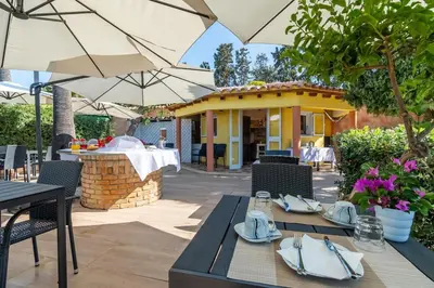 Ristorante o altro punto ristoro di Villa Praesidium pied dans l'eau, on the beach