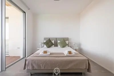 Letto o letti in una camera di Villa Valentina