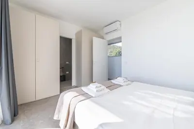 Letto o letti in una camera di Villa Valentina