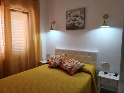 Letto o letti in una camera di Appartamento Le Rondini