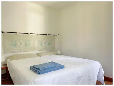 Letto o letti in una camera di La casetta