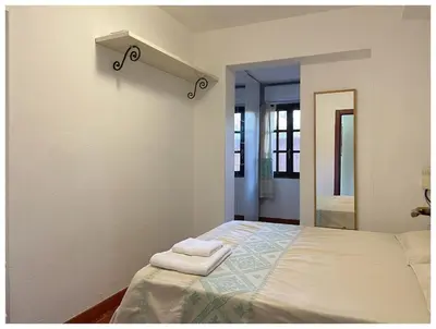 Letto o letti in una camera di La casetta